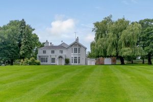 Ralph reviews a country house with ten acres in chester front view 