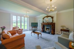 Ralph reviews a country house with ten acres in chester living room 