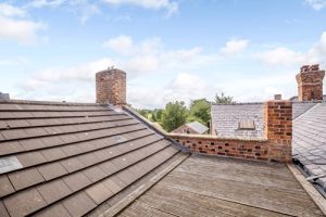 Ralph reviews a period property with shop in tarporley roof