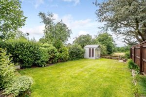 Ralph reviews a period property with shop in tarporley garden view 