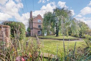 Ralph reviews a period property with additional accomodation back view