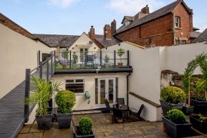 spkit level patio areas at a house for sale in Farndon