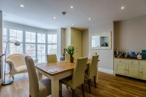 Dining room with large bay window in a house for sale in Farndon