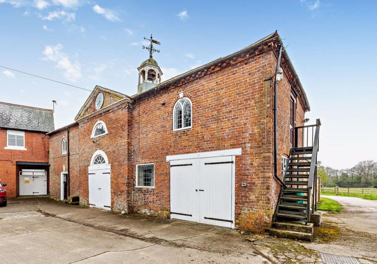 outbuilding with clock tower at a house for sale in Malpas