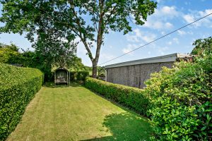 the garden overlooking fields in a house for sale near Malpas