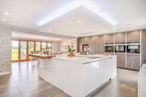 contemporary kitchen with white modern units in house for sale with Chester estate agency Rickitt Partnership