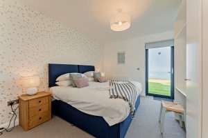 bedrooms and bathroom in a holiday cottage for sale at Nature's Retreat