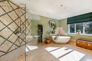 contemporary bathroom with free standing bath in a house for sale in Farndon