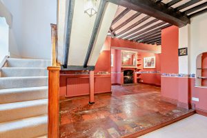 the sitting room in a period house for sale in Malpas