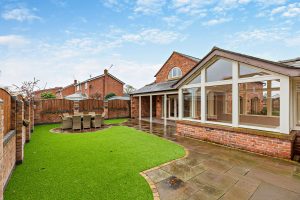 garden with artificial grass in a house for sale in Holt with Rickitt Partnership estate agency