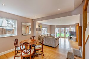 open plan family cum dining room in a detached house for sale in Holt