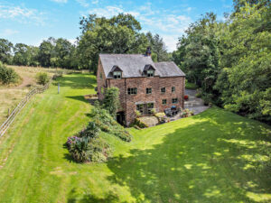  a detached former mill house for sale in Tilston, Cheshire