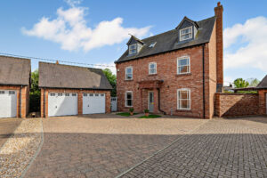 a modern detached house for sale in Holt