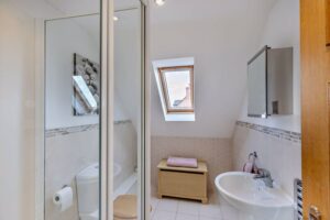 second floor bedroom in a house for sale in Holt village marketed by Rickitt Partnership estate agents