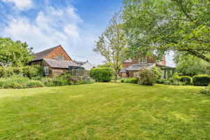 the country garden at a farmhouse for sale in Churton
