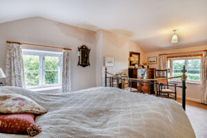 cottage bedrooms at a farmhouse for sale in Churton