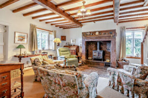 the sitting room in a detached period farmhouse for sale in Churton