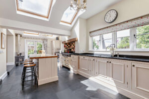 the open plan kitchen dining family room in a house for sale in Farndon